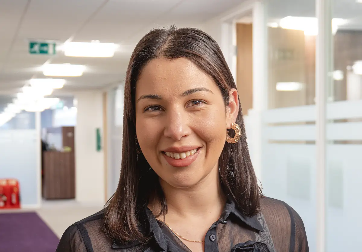 Paola Mesa Romero stood in a corridor in Vygon's head office.